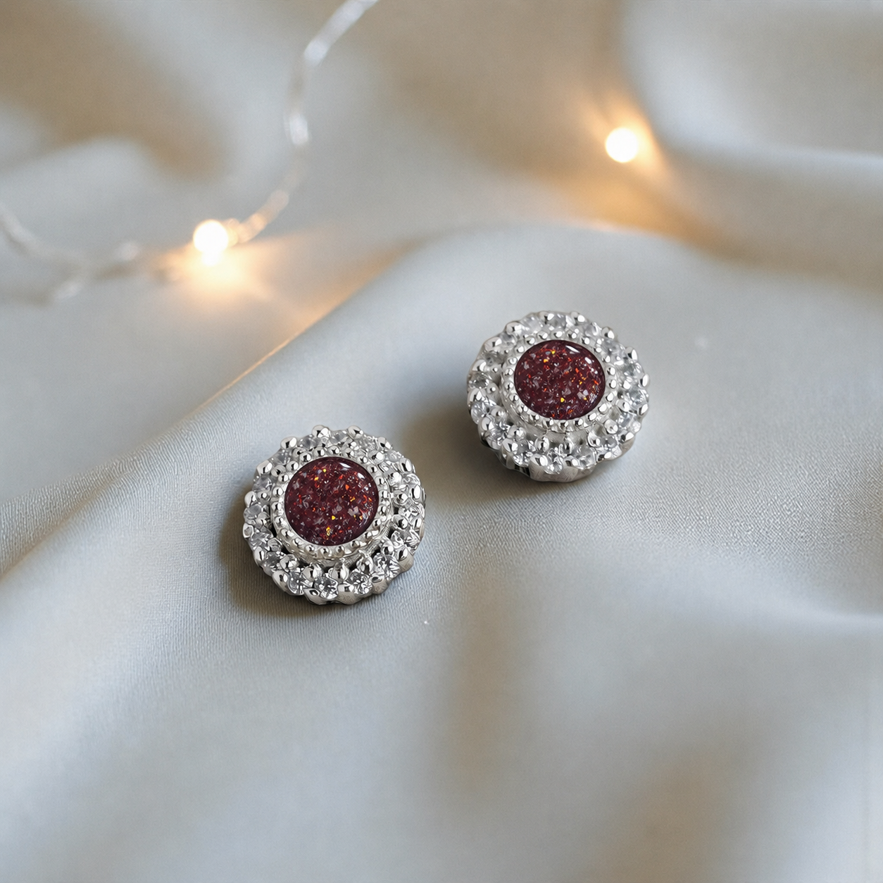 Halo's memorial stud earrings in Ruby Red opal — sterling silver, handcrafted in Lancashire, UK