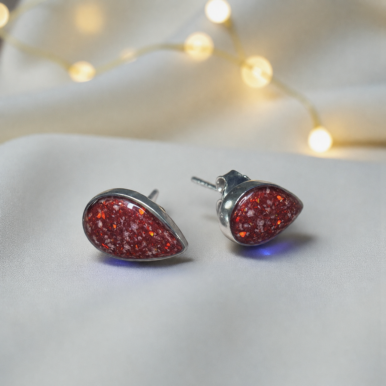 Pure Radiance memorial earrings in Ruby Red opal — sterling silver, handcrafted in Lancashire, UK