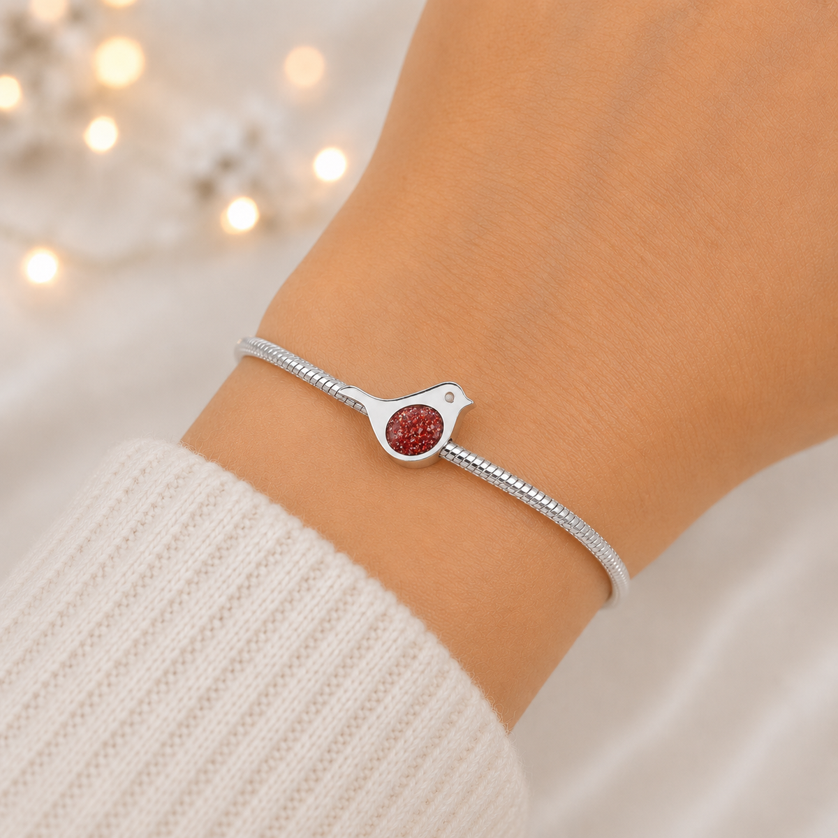 Keepsake memorial silver Robin  ashes charm, in ruby red, handcrafted in Lancashire, UK