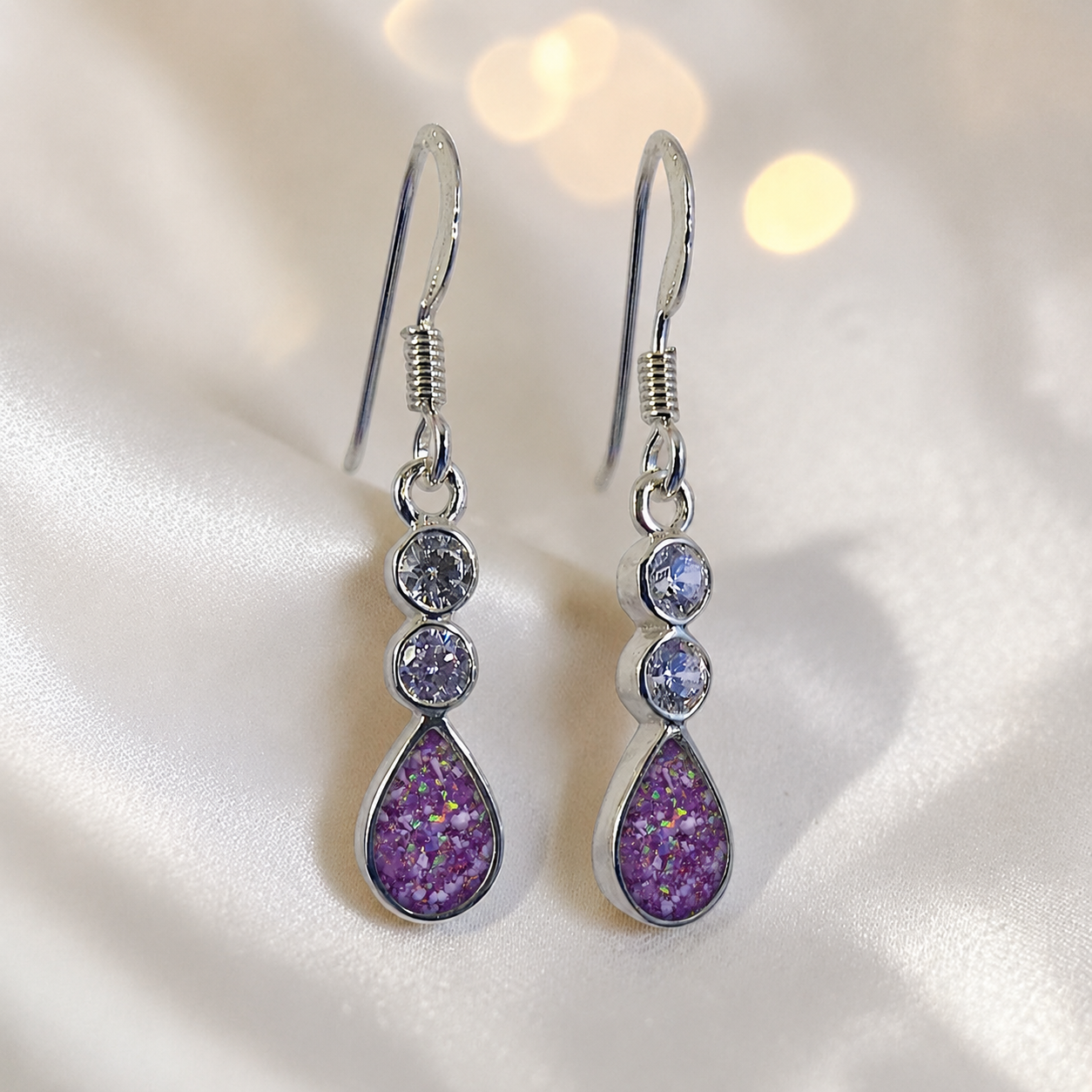 Acrux Earrings — silver pear drop ashes memorial earrings in Rose Pink resin, handcrafted in Lancashire, UK