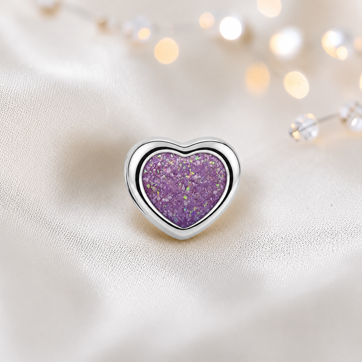 Rose pink sterling silver peaceful heart ashes memorial charm, handcrafted in Lancashire by keepsake memorial