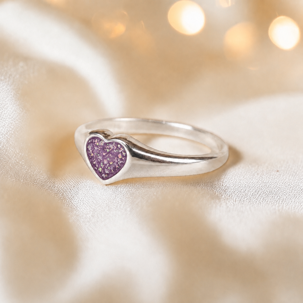Eden Heart shaped memorial ashes ring in rose pink,  handcrafted in Lancashire, UK.