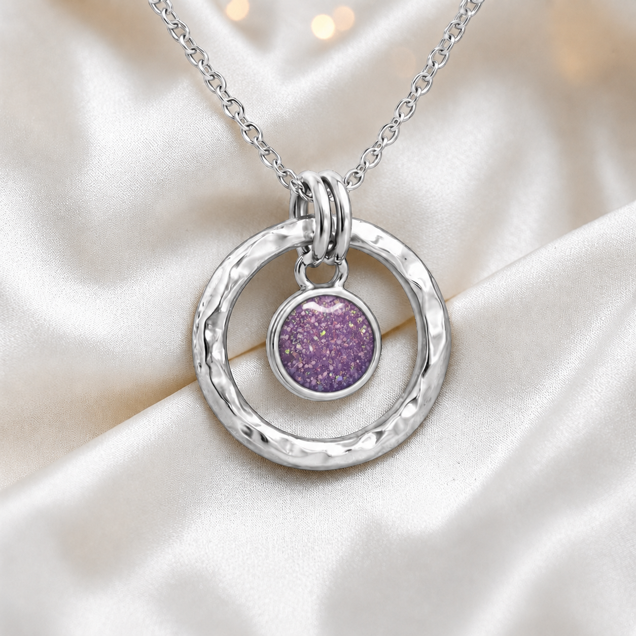 Rose Pink hammered hollow circle sterling silver memorial pendant, handcrafted in Lancashire UK by Keepsake Memorial Jewellery
