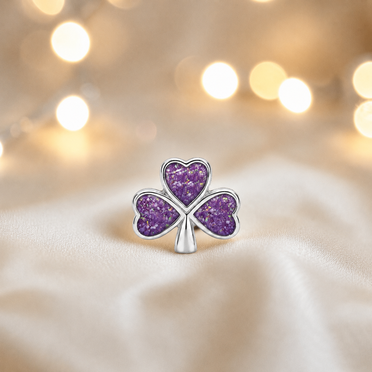 Rose pink sterling silver shamrock ashes memorial charm, handcrafted in Lancashire by keepsake memorial