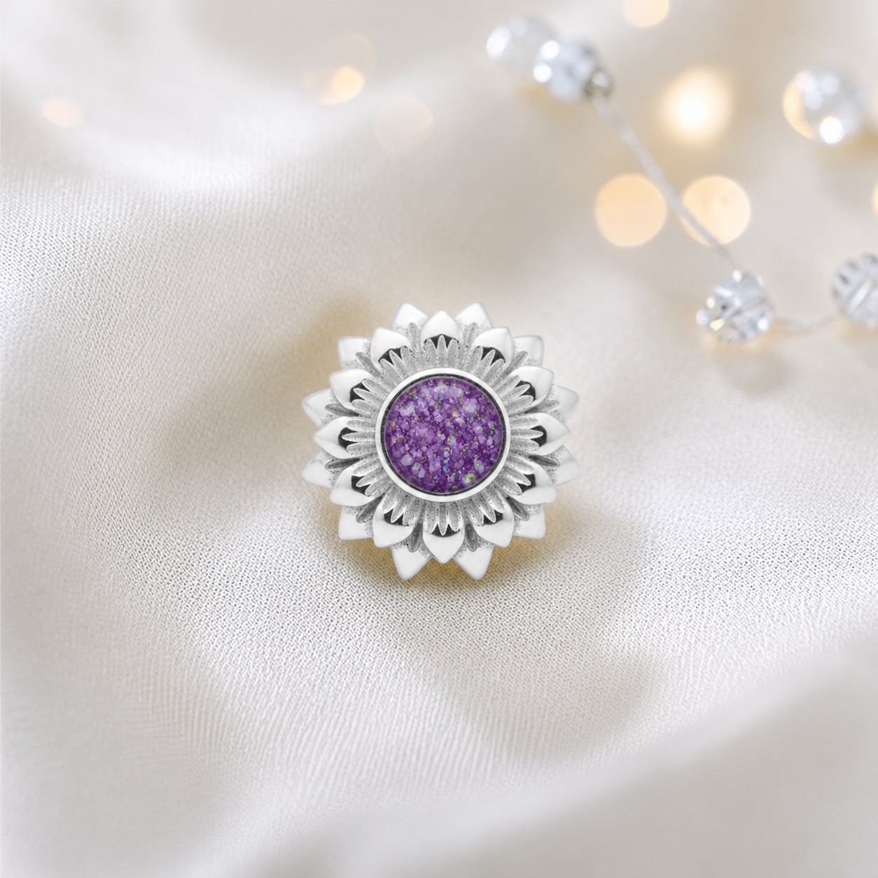 Rose pink sterling silver sunflower ashes memorial charm, handcrafted in Lancashire by keepsake memorial
