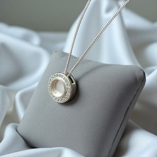 Silver round crystal ashes memorial pendant, handcrafted in Lancashire, UK