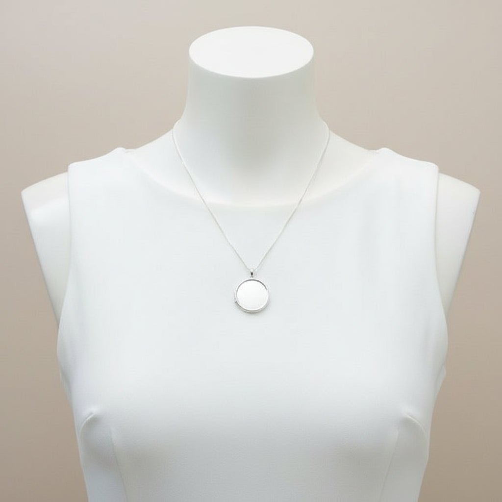 silver round keepsake locket uk