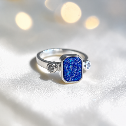 Keepsake Memorial Silver Anastasia Emerald Cut Ashes Ring in Royal Blue — handcrafted in Lancashire, UK