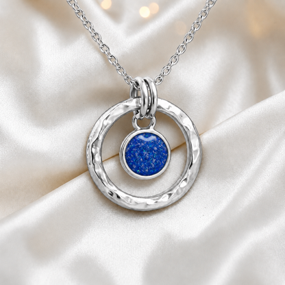 Royal blue hammered hollow circle sterling silver memorial pendant, handcrafted in Lancashire UK by Keepsake Memorial Jewellery
