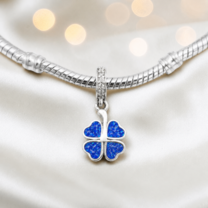 Royal blue sterling silver clover dangle ashes memorial charm, handcrafted in Lancashire by keepsake memorial
