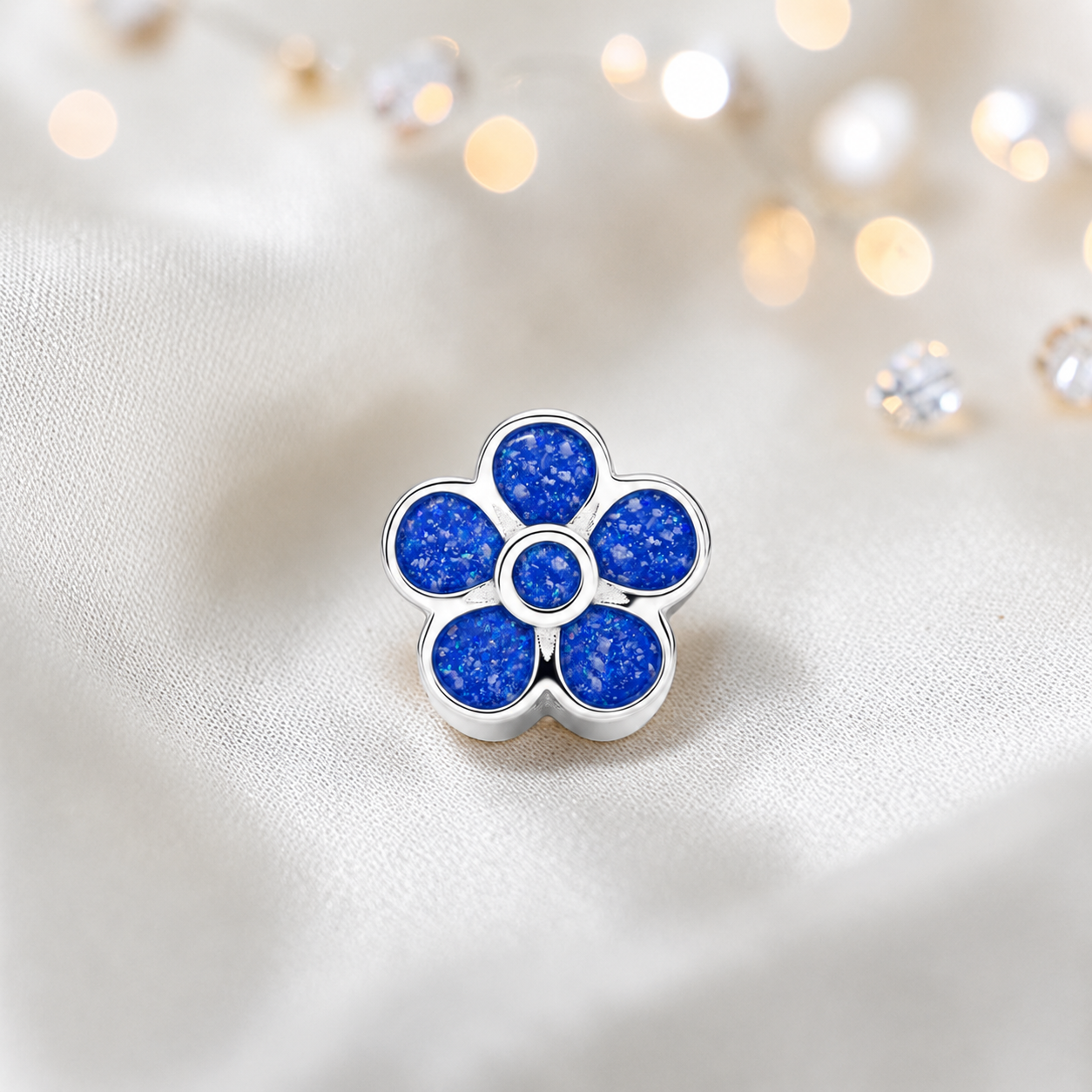 Royal Blue sterling silver flora, flower ashes memorial charm, handcrafted in Lancashire by keepsake memorial