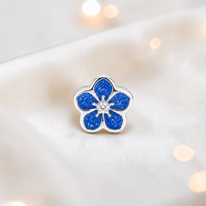 Royal blue sterling silver forget me not ashes memorial charm, handcrafted in Lancashire by keepsake memorial