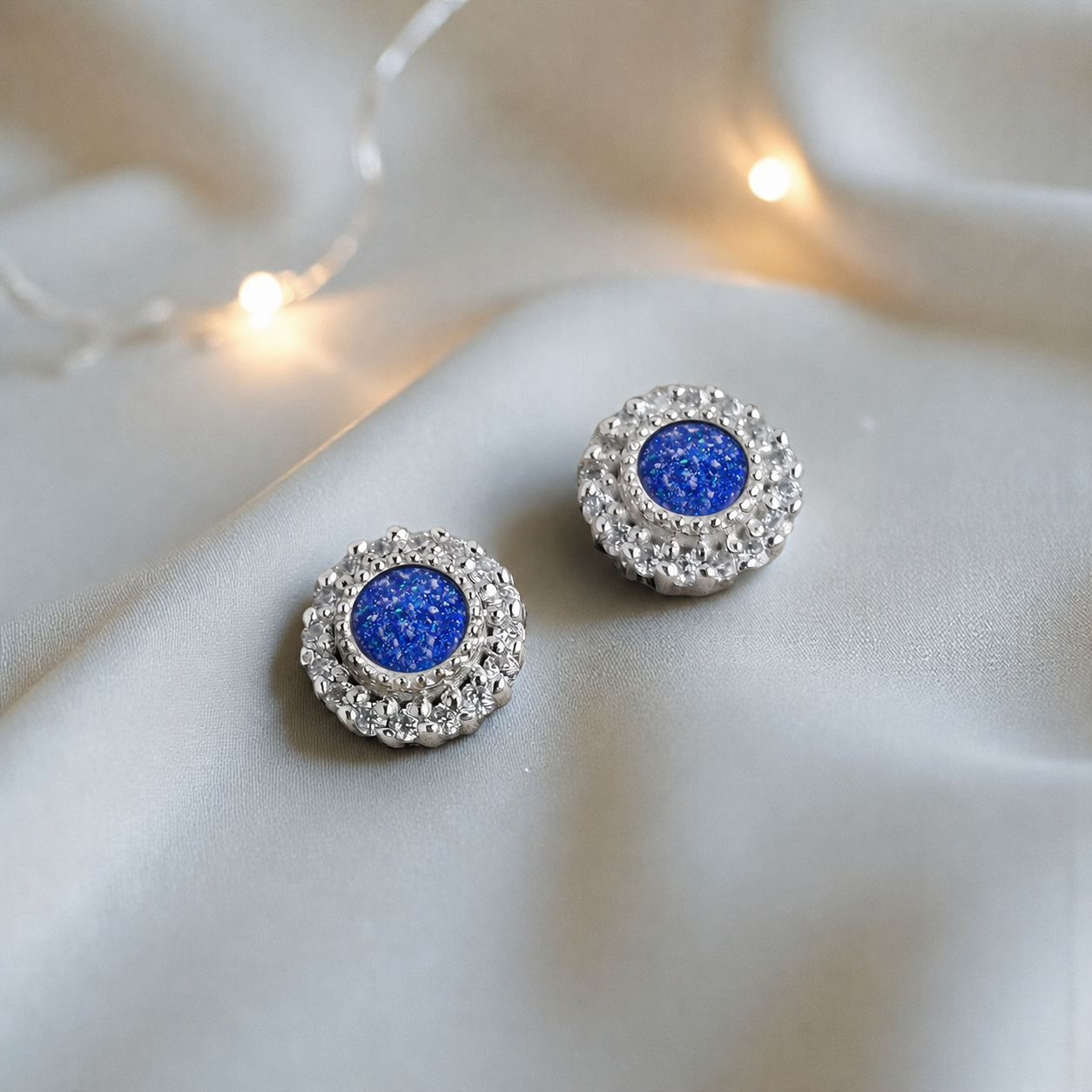 Halo's memorial stud earrings in Royal Blue opal — sterling silver, handcrafted in Lancashire, UK