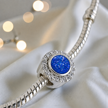 Royal Blue sterling silver halo ashes memorial charm, handcrafted in Lancashire by keepsake memorial