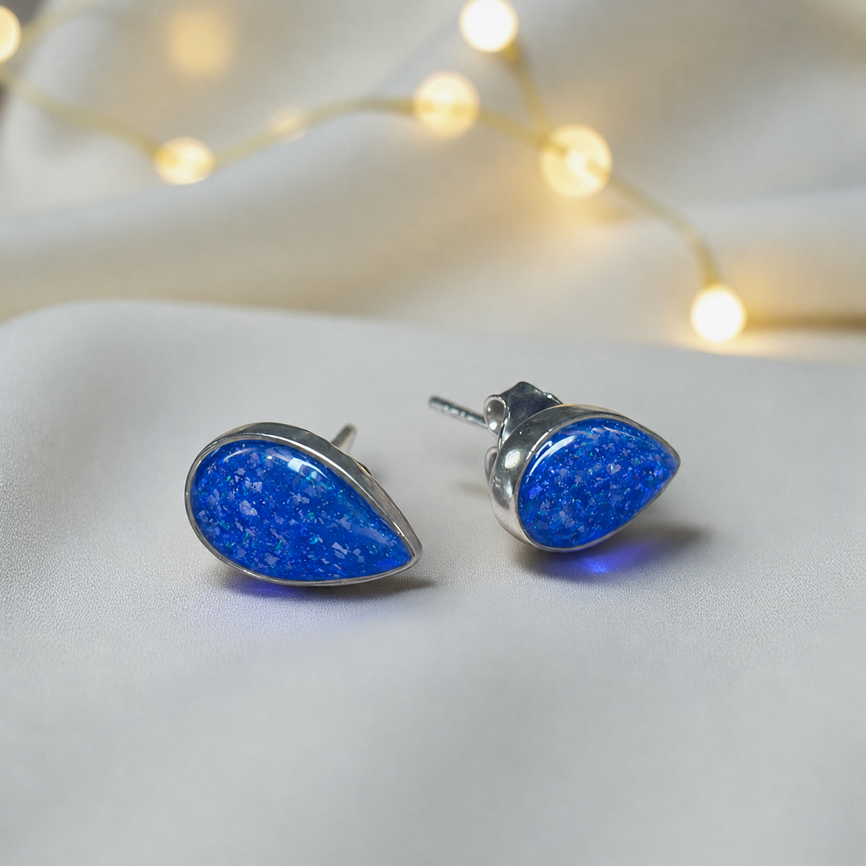 Pure Radiance memorial earrings in Royal Blue opal — sterling silver, handcrafted in Lancashire, UK