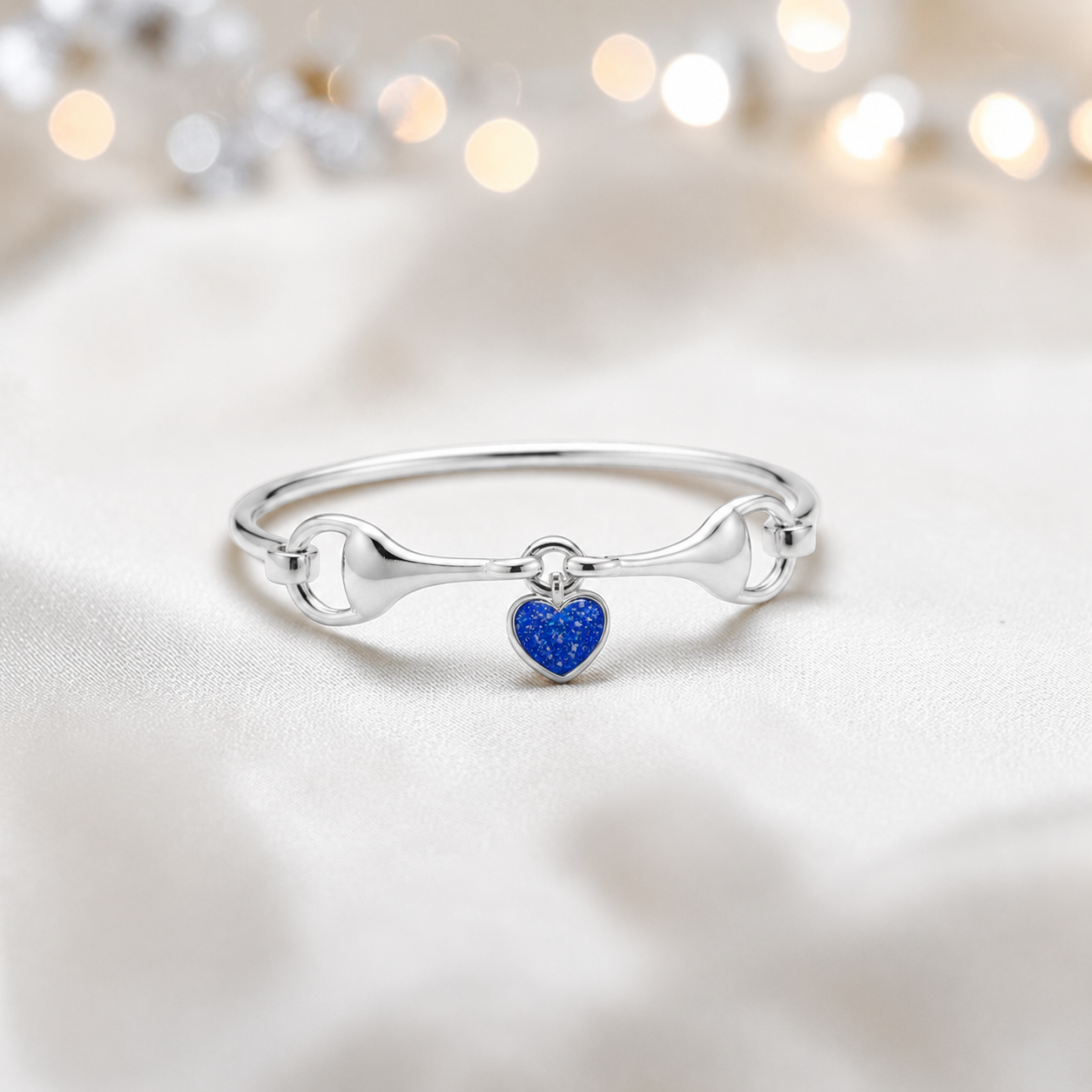 Silver Rocket snaffle bit ashes bangle in royal blue,  handcrafted in Lancashire UK - by Keepsake Memorial Jewellery