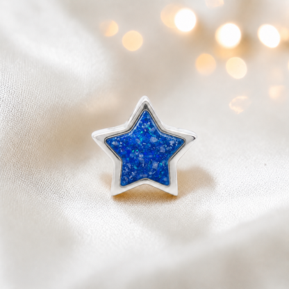 Royal blue sterling silver star ashes memorial charm, handcrafted in Lancashire by keepsake memorial