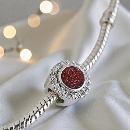 Ruby red sterling silver halo ashes memorial charm, handcrafted in Lancashire by keepsake memorial