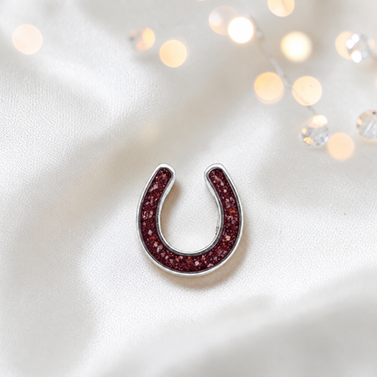 Maverick horseshoe ashes charm, in ruby red, handcrafted in Lancashire UK - by Keepsake Memorial Jewellery 