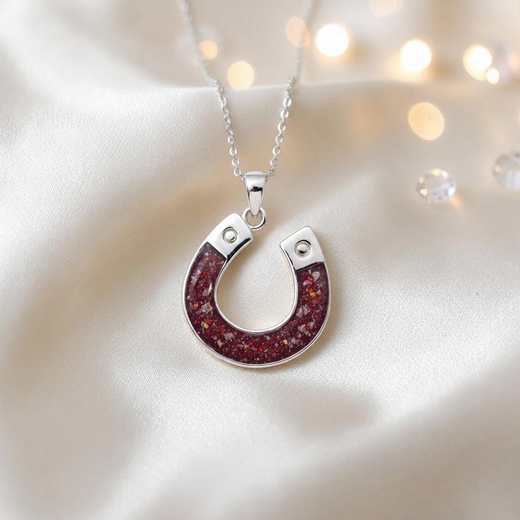 Midnight horseshoe ashes pendant in ruby red, handcrafted in Lancashire UK - by Keepsake Memorial Jewellery