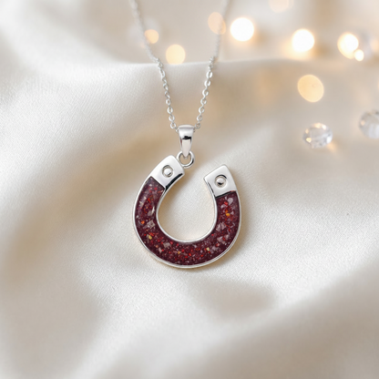 Midnight horseshoe ashes pendant in ruby red, handcrafted in Lancashire UK - by Keepsake Memorial Jewellery