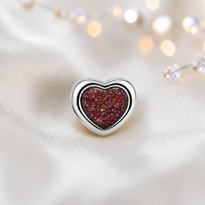 Ruby red sterling silver peaceful heart ashes memorial charm, handcrafted in Lancashire by keepsake memorial