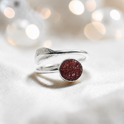 Feather Whisper Ring — silver feather ashes memorial ring, in ruby red, handcrafted in Lancashire, UK