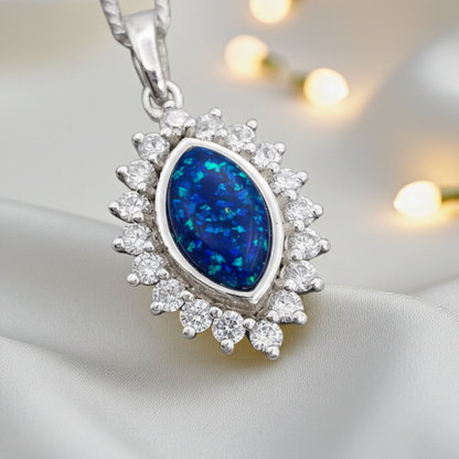 Princess CZ oval ashes pendant in sapphire blue, handcrafted in Lancashire UK