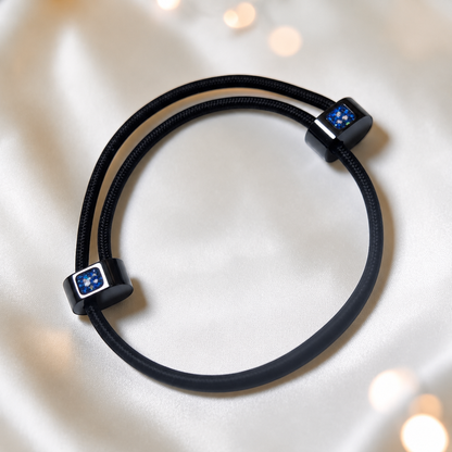 Sapphire glow Atlas men's stainless steel and cord memorial bracelet , handcrafted in Lancashire UK by Keepsake Memorial Jewellery