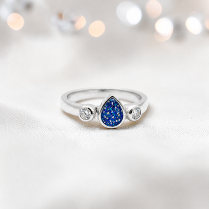 Keepsake Memorial Silver Cassiel Ashes Ring in sapphire glow - Handcrafted in the UK