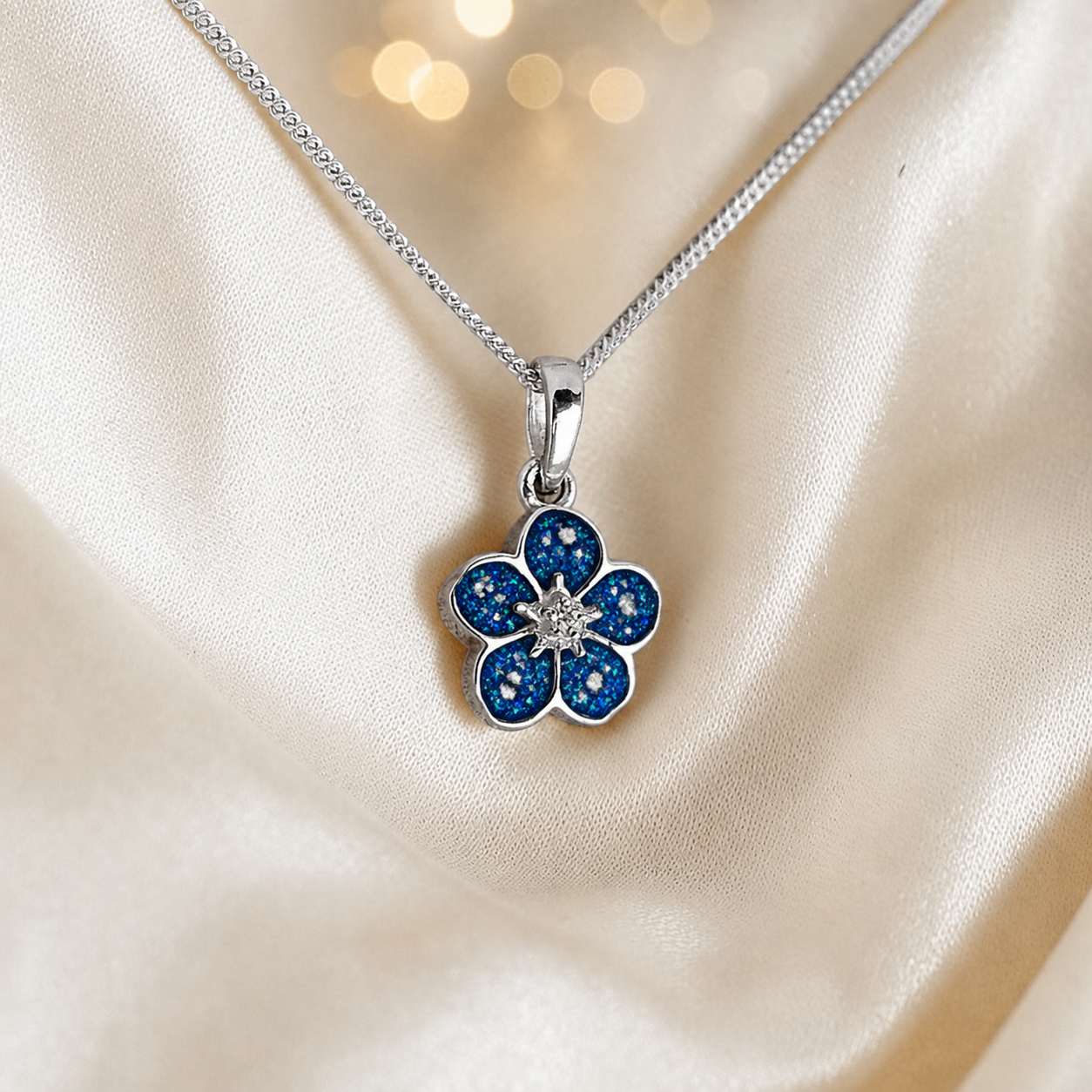 925 Sterling Silver Forget Me Not Memorial Pendant in sapphire glow - Keepsake Memorial Jewellery