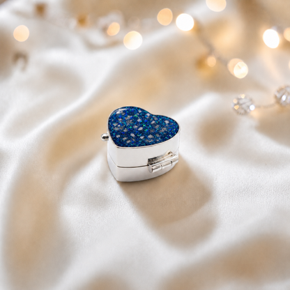 Sterling silver ashes heart trinket box in sapphire glow, handcrafted in Lancashire, UK - by Keepsake Memorial Jewellery