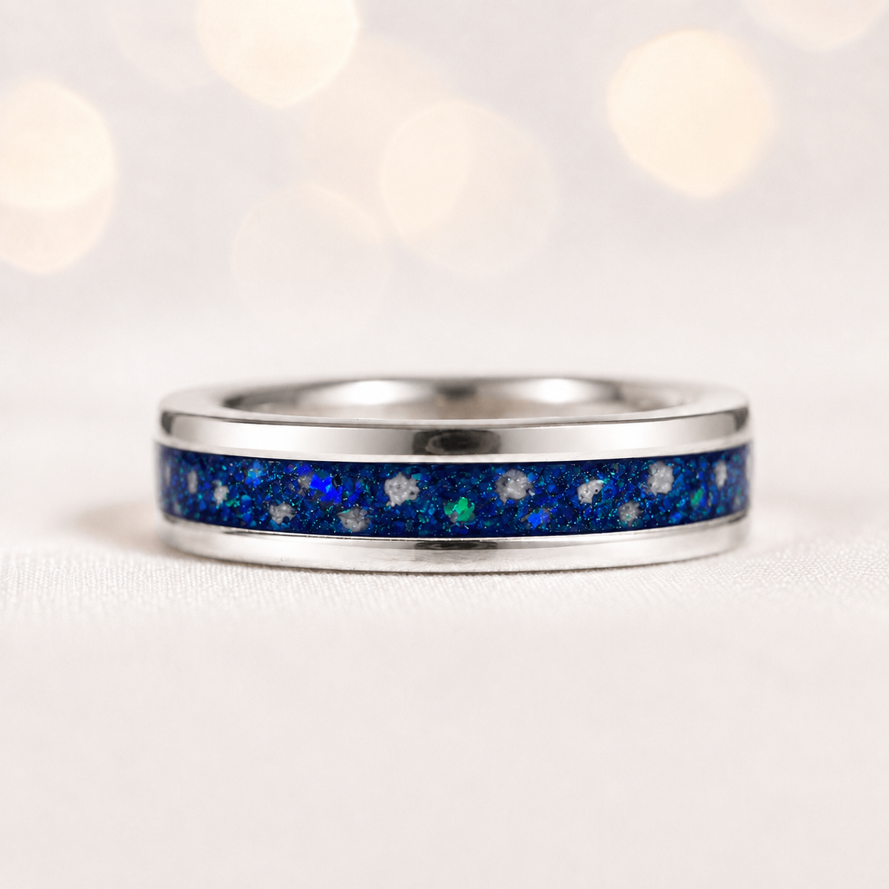 Sapphire glow Horizon unisex sterling silver channel memorial band ring, 5.5mm wide, handcrafted in Lancashire UK by Keepsake Memorial Jewellery