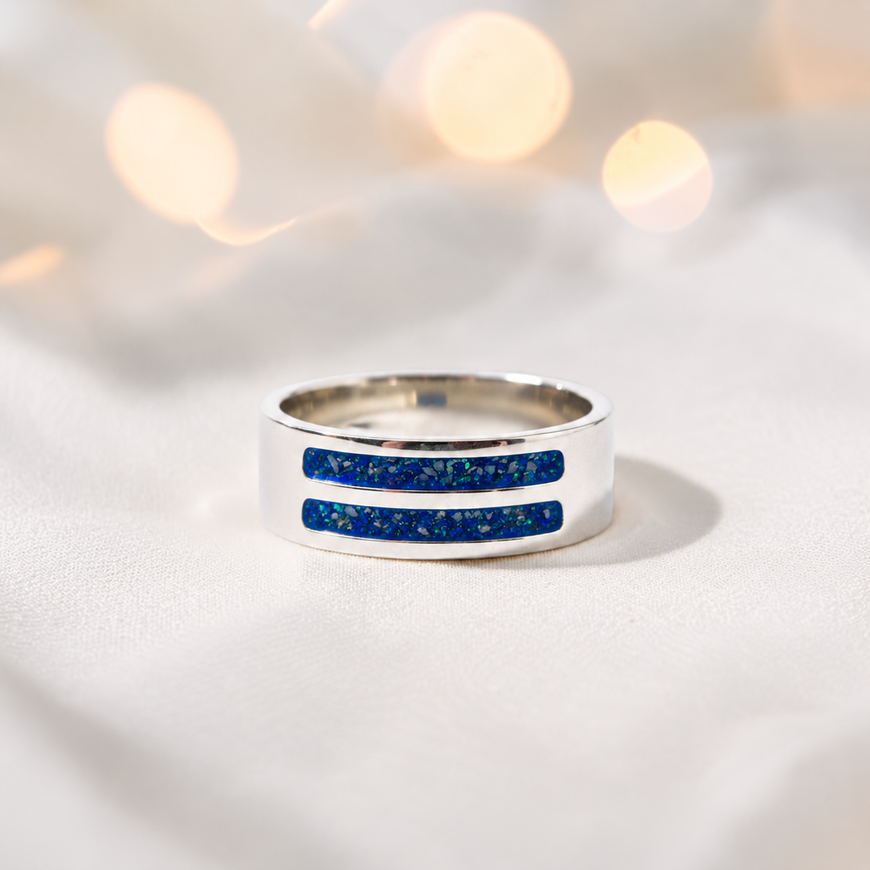 Sapphire glow Strata men's sterling silver double channel memorial ring, wide comfort-fit band, handcrafted in Lancashire UK by Keepsake Memorial Jewellery