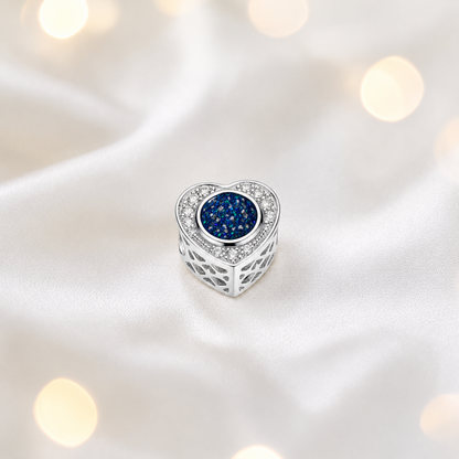 Sapphire glow sterling silver heart of memories ashes memorial charm, handcrafted in Lancashire by keepsake memorial