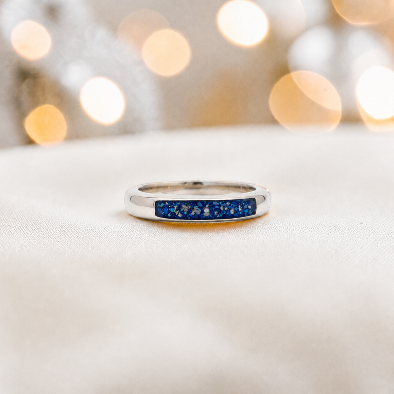 Keepsake Memorial Iris wishbone ashes ring in sapphire glow, handcrafted in Lancashire 