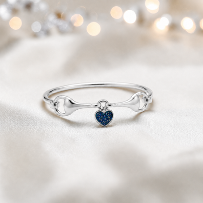 Silver Rocket snaffle bit ashes bangle in sapphire glow,  handcrafted in Lancashire UK - by Keepsake Memorial Jewellery