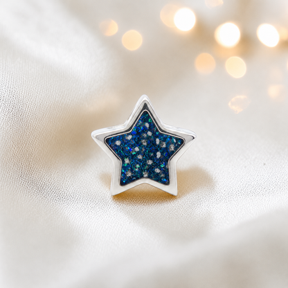 Sapphire glow sterling silver star ashes memorial charm, handcrafted in Lancashire by keepsake memorial