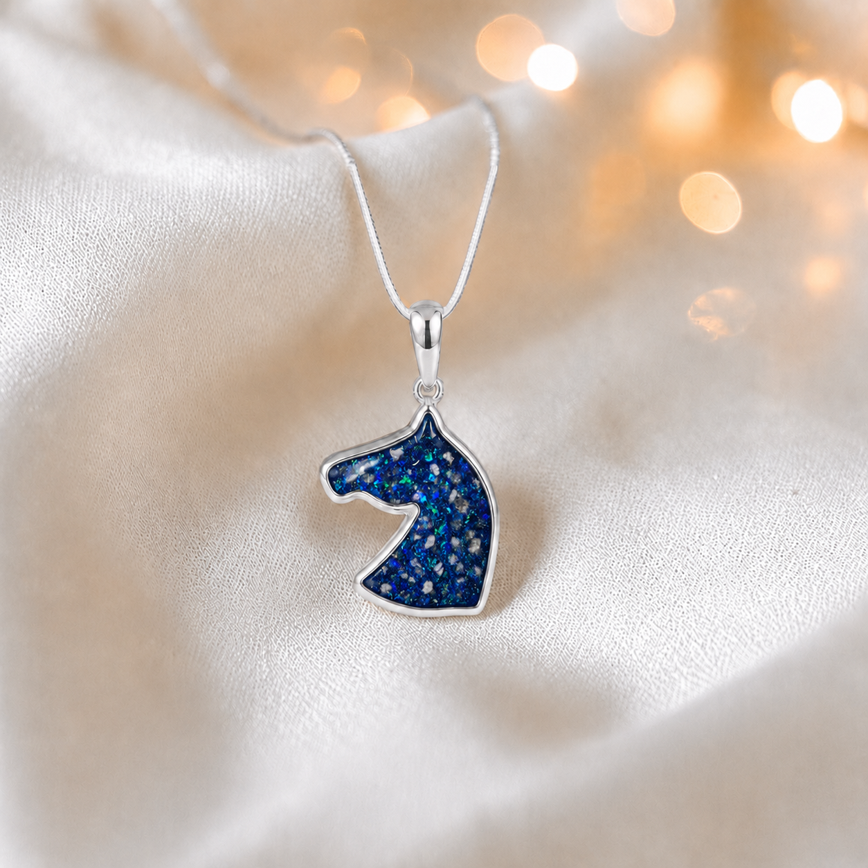 Willow horse head ashes pendant in sapphire glow, handcrafted in Lancashire UK - by Keepsake Memorial Jewellery
