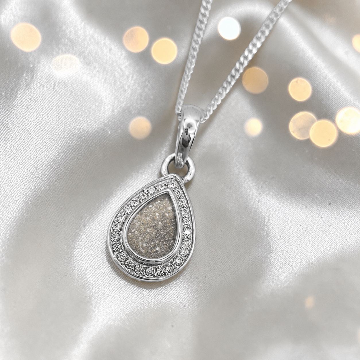 seraph glow pear shaped ashes pendant with CZ in natural ash, handcrafted in Lancashire UK