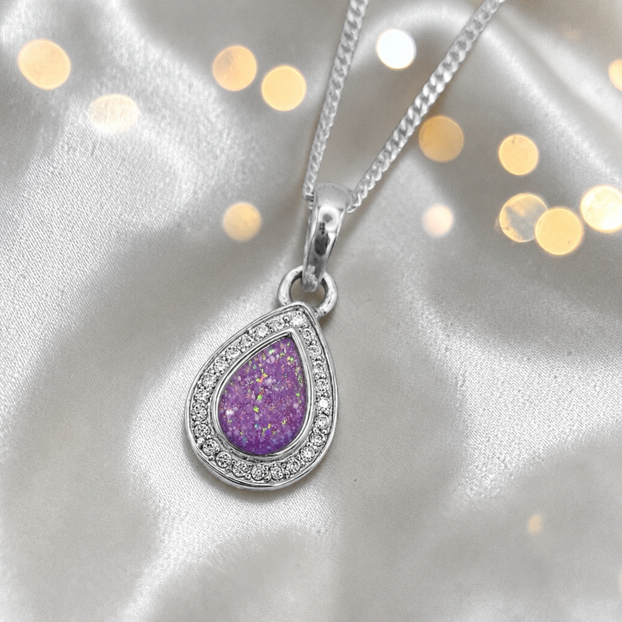 seraph glow pear shaped ashes pendant with CZ in rose pink, handcrafted in Lancashire UK