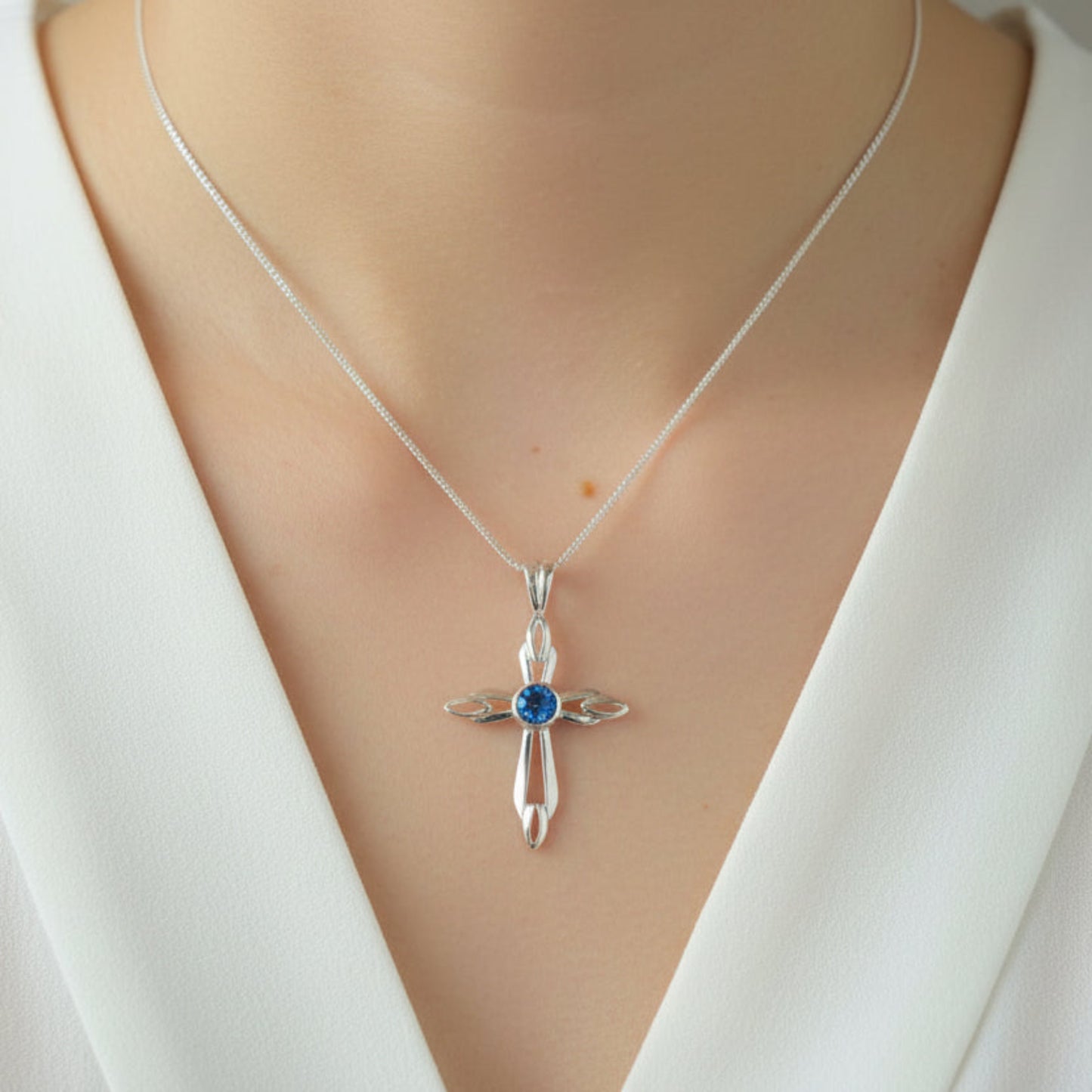 silver cross ashes pendant on model uk