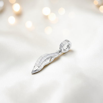 white snow sterling silver heavens feather  ashes memorial dangle  charm, handcrafted in Lancashire by keepsake memorial