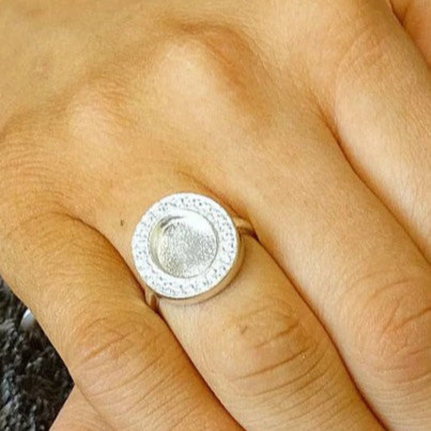 Halo Ring worn on hand — silver halo ashes memorial ring, handcrafted in the UK