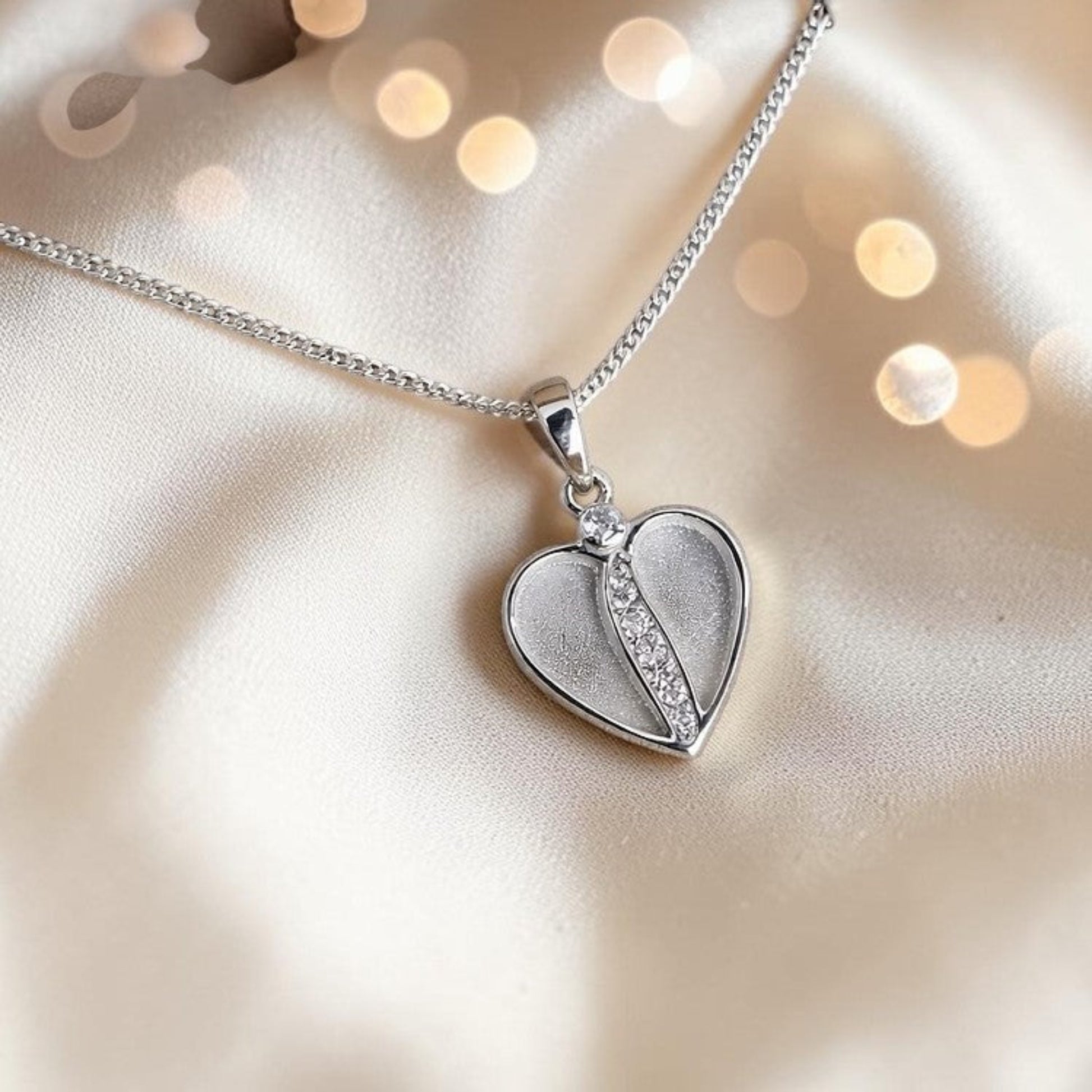 Sterling silver heart ashes memorial pendant, handcrafted in Lancashire by Keepsake Memorial Jewellery