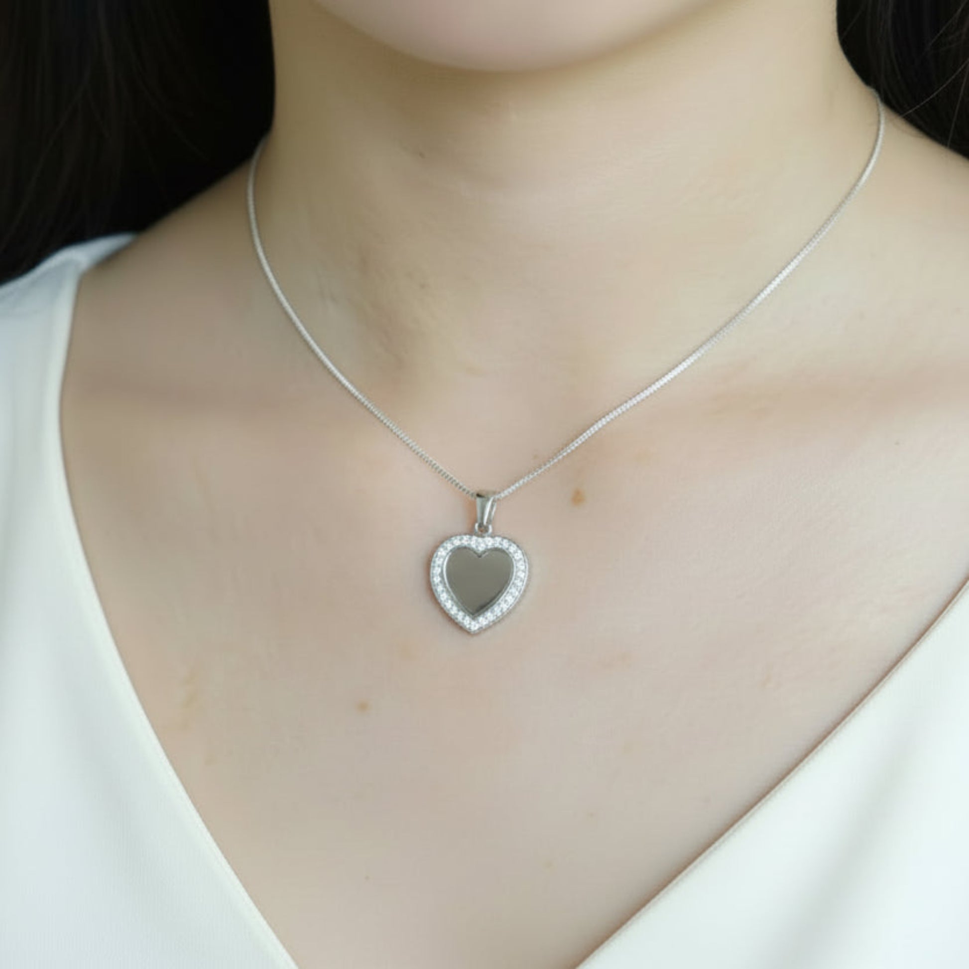 silver heart ashes pendant on model uk