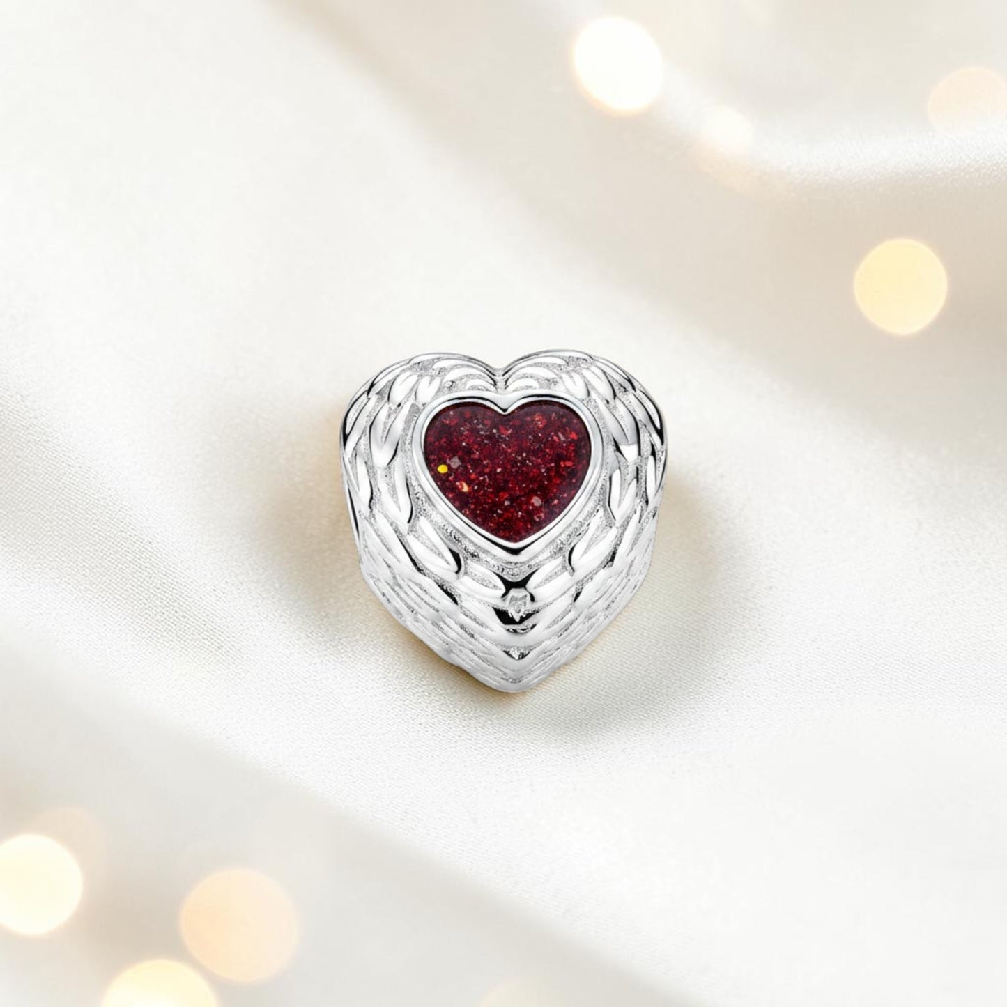 Ruby red sterling silver peaceful whisper heart ashes memorial charm, handcrafted in Lancashire by keepsake memorial