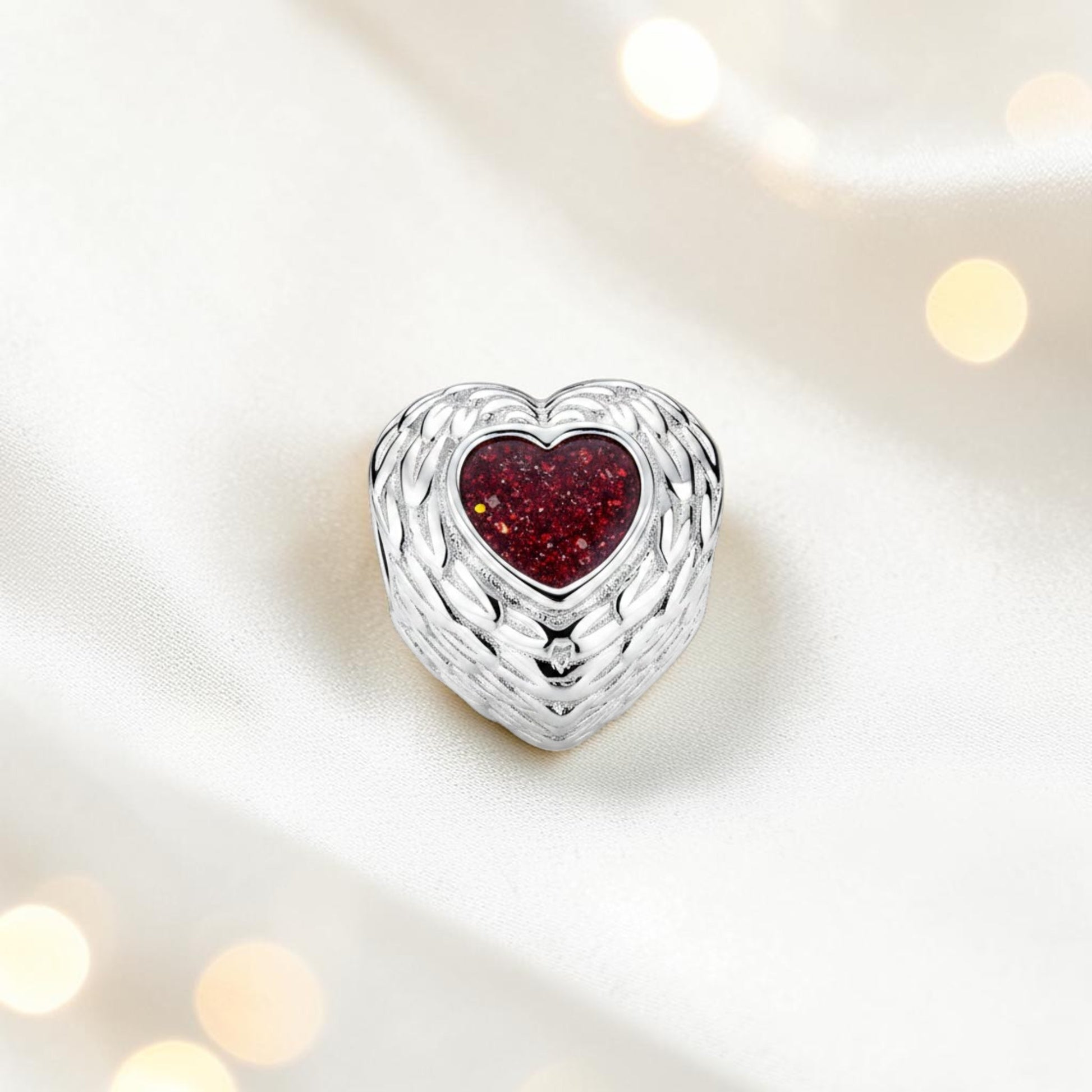 Ruby red sterling silver peaceful whisper heart ashes memorial charm, handcrafted in Lancashire by keepsake memorial