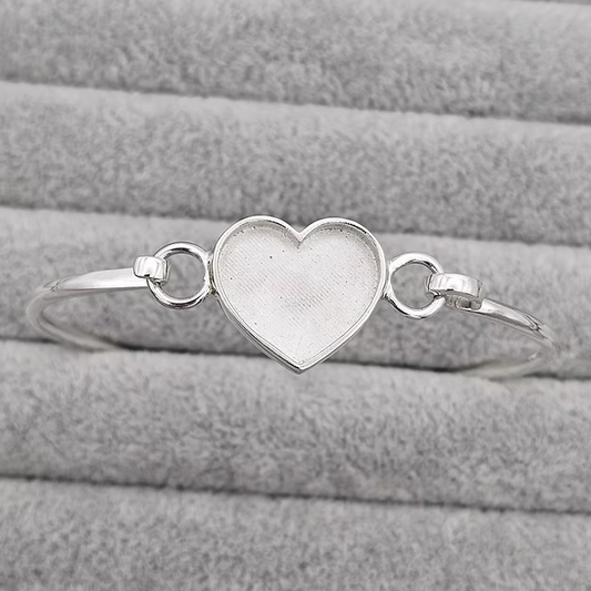 Silver heart shaped memory jewellery bangle, handcrafted in Lancashire, UK