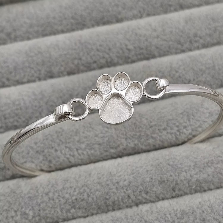 Silver dog paw ashes bangle, handcrafted in Lancashire, UK
